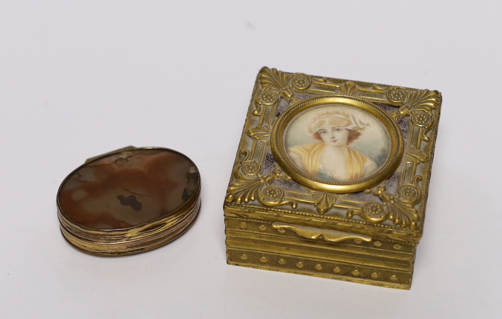 Two boxes comprising agate and a gilt metal example with inset portrait of a lady together with a cased DuPont lighter